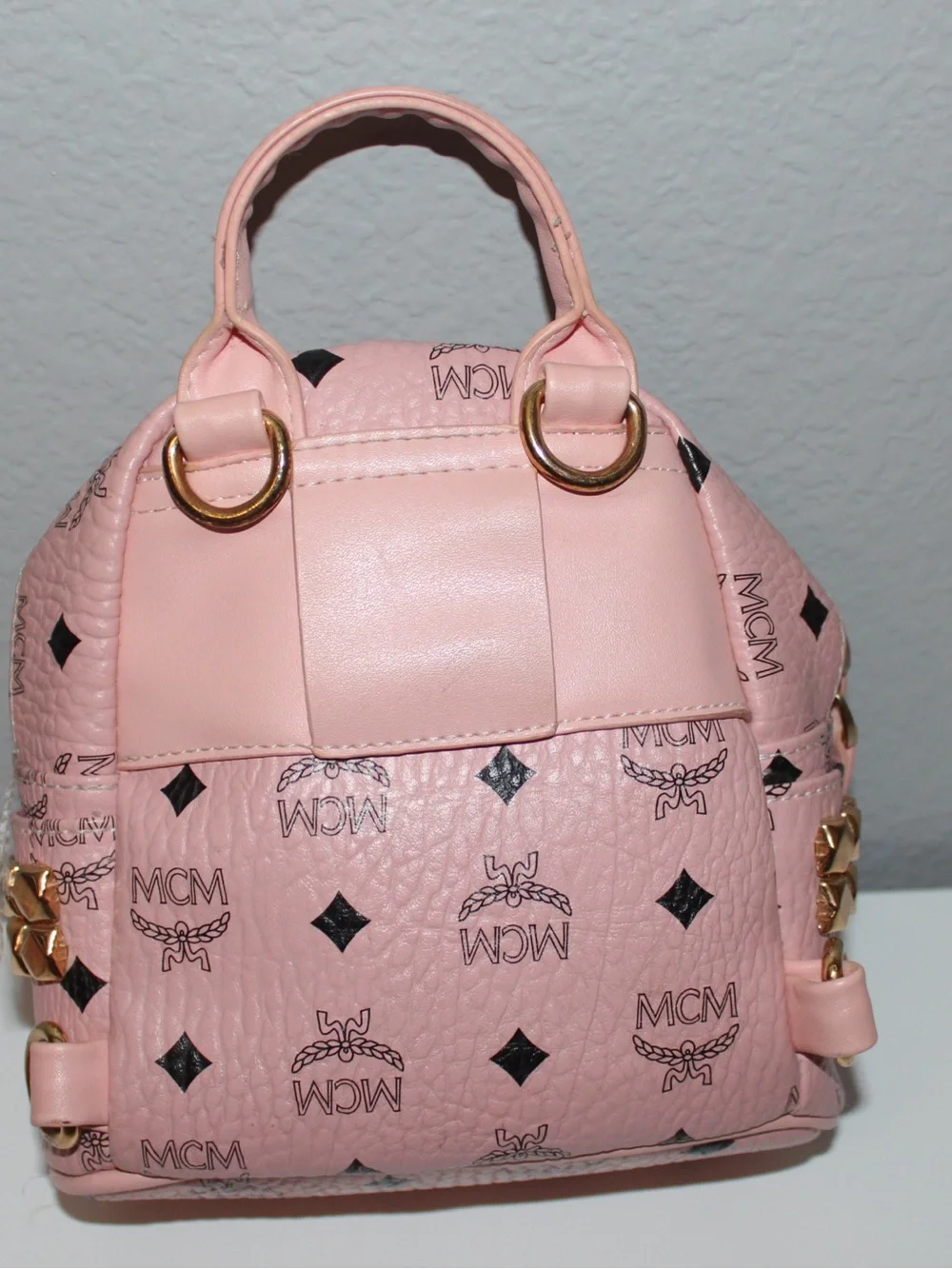 MCM Pink Logo Print Mini Backpack with Gold Hardware